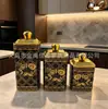 Pote de armazenamento cruzado Amazon mais vendido pote selado caixa de doces jarra de ouro com estampagem a quente luxo leve com tampa pote de armazenamento