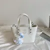 Bolso pequeño para mujer 2026 modelo nuevo primavera-verano, textura de alta calidad, diseño de nicho, bolso bandolera versátil vintage, bolso de mano tipo cubo