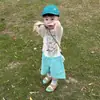 Camiseta de Verano para Niños Conjunto Infantil 2026 Nuevo Casual Holgado con Lunares Camisa Protectora Solar Top de Estilo Relajado para Bebé