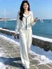 Conjunto deportivo casual blanco para mujer, moda otoño 2026 nuevo elegante de alta gama, sudadera con capucha y pantalones largos conjunto de tres piezas