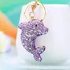 Chaveiro de carro de golfinho fofo com adornos completos de strass, um pingente 3D criativo, perfeito como presente para bolsas femininas ou chaveiros