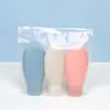 Kit de Viagem com Frasco para Cuidados Pessoais 4 em 1: Shampoo, Gel de Banho, Produtos para Cuidados com a Pele e Amostra Grátis.
