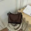 Bolsa tote de lona texturizada simples estilo coreano para mulheres, novo modelo 2026, bolsa de ombro e transversal de grande capacidade para o dia a dia