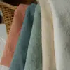 Al por mayor Bordado en relieve Patrón oscuro Color sólido Jacquard Algodón Puro Tela Vestido Hanfu Tela para Ropa DIY