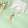 Cordón para teléfono con cadena de pedrería, correa corta para el cuello cruzada en forma de corazón, cadena de muñeca de moda para teléfono, venta al por mayor transfronteriza