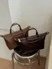Bolsa transversal de design nicho coreano para mulheres, nova moda 2026 bolsa de ombro de grande capacidade, bolsa de antebraço vintage de alta qualidade