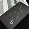 Colar minimalista com pingente quadrado único e design oco irregular, corrente longa de aço titânio não desbota, estilo nicho