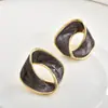 Pendientes de gota de aceite de banda de Möbius retro franceses Diseño de nicho Lujo ligero Esmalte Accesorios de pendientes de moda