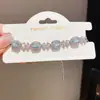 Pulsera de doble capa con flor de trébol de circón estilo coreano, elegante y lujosa, versátil y moderna para el uso diario