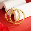 Aretes trenzados chapados en oro vietnamitas para mujer, Accesorios estilo chino, Versátiles, Populares en transmisiones en vivo, Aretes de fuente de fábrica al por mayor