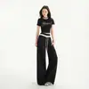 25 años primavera y verano nuevo diseño de encaje de color contrastante cintura elástica caída deportes casuales ligeramente holgados de campana pantalones para mujer
