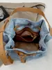 Bolsa tote de gran capacidad Shuai Mi Jia para mujer, nuevo modelo de verano 2026, elegante y atractiva, adecuada para ir al trabajo, bolso de hombro y cruzado