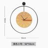 Reloj de pared de hierro decorativo de lujo con luz creativa y estilo moderno y sencillo para sala de estar española