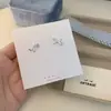 Pendientes Azules de Serie Sal Marina Dulce con Lazo y Corazón Geométrico para Mujer, Fresco Diseño de Primavera y Verano, Pendientes Suaves de Nicho