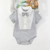 Vestido de verano estilo británico con forma de triángulo y tirantes finos, con mangas cortas y lazos para niños y bebés, ropa de escalada de una pieza para bebés en verano.