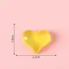 Encantos creativos de corazón pequeño que brillan en la oscuridad, materiales para manualidades DIY, incluyendo pegamento cremoso, fundas para teléfono, pinzas para el cabello, ligas para el cabello y decoraciones de resina