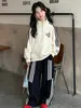 Conjunto Deportivo Casual para Niñas 2026 Otoño Nueva Moda Sudadera con Cuello Alto y Pantalones de Pierna Ancha Conjunto de Dos Piezas para Niños Mayores