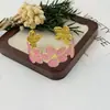 Pulsera floral de acero inoxidable con goteo de aceite, lujo ligero con un toque de alta gama, diseño floral abierto, joyería transfronteriza europea y americana, envío directo de una pieza, estilo geométrico