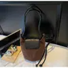 Bolso Cubo Retro Pequeño para Mujer 2026 Otoño Nuevo Estilo Popular Este Año Elegante Moda para el Trabajo Bolso Cruzado