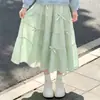Conjunto de dos piezas para niña: una sudadera con cuello de muñeca y una falda midi de moda con lazo, perfecta para principios de otoño, adecuada para la escuela