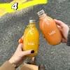 Bebida de Vino de Frutas Reenvasada Botella Sellada con Tapa 330ml Botella de Agua Mineral Botella de Café Cold Brew Botella de Savia de Abedul Botella de Vidrio