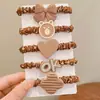 Color Té con Leche Set de 5 Piezas de Diadema para Niñas, Banda para el Cabello, Goma Elástica para Cola de Caballo Alta Femenina, Accesorios para el Cabello de Dibujos Animados Ins, Cuerda para el Cabello al por Mayor