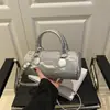 Bolsas Pequenas Populares para Mulheres Este Ano 2025 Nova Bolsa Transversal de Design de Nicho Casual de Verão Bolsa de Almofada de Mão