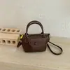 Bolsa de Mão da Moda Tendência de Nicho para Mulheres Nova Versátil Retro Bolsa Transversal Estilo Coreano Simples de Ombro Único Pequena Quadrada