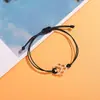Europa y Estados Unidos transfronterizo Amazon más vendido pulsera de tarjeta pata de perro hilo negro rojo pulsera tejida a mano para mujer