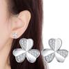 Elegantes aretes de trébol de moda 2023 nueva tendencia aretes giratorios de hierba de tres hojas incrustados de diamantes