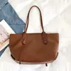 Bolsos tejidos de gran capacidad europeos y americanos para mujer, nuevos bolsos de hombro versátiles de moda 2026, bolsos tote de alta gama para el trabajo