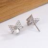 Pendientes de lazo de diamantes de moda, estilo coreano, temperamento femenino, nicho, pendientes de diamantes de alta gama, dulces pendientes Chanel