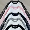 Diseño Otoño e Invierno Moda Raglán Bloques de Color Manga Larga Personalizado Estampado de Letras con Capucha Cuello Redondo Sudadera Urbana