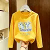 Camiseta de manga larga para niño 2026 modelo nuevo de otoño, manga larga algodón puro estampado de dibujos animados camiseta base para niños top