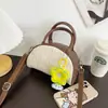 Bolsa Feminina Tecida de Palha Transfronteiriça 2026 Nova Bolsa de Concha Simples Bolsa de Palha Tecida Bolsa Transversal Corrente Bolsa de Ombro Fashion