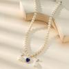 Colar de pérolas feito à mão com design de nicho feminino Azul Amor senso de design avançado outono e inverno corrente clavicular de camada dupla feminina