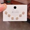 Nuevo Set Elegante de Seis Piezas de Aretes de Flor de Cuatro Hojas de Zirconia Aguja de Plata para Mujer con Pequeños Aretes Frescos Elegantes Tres Pares de Aretes
