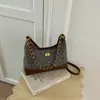 Bolsa feminina única estilo retrô, moderna e versátil, bolsa casual acolchoada com corrente, bolsa simples de ombro e transversal