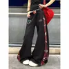 Pantalones de chándal anchos a rayas con notas musicales estilo americano 2026 para hombre y mujer, estampado desgastado, cintura elástica, puños ajustables, corte holgado, pantalones de largo completo
