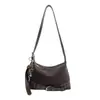 Bolsa Baguete Portátil Retro Coreana para Mulheres Inverno 2025 Nova Bolsa de Ombro Único Transversal Estilo Ocidental com Retalhos de Alta Qualidade