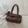 Bolsa de ombro underarm trendy e única estilo coreano, novo modelo para o início do outono de 2026, bolsa tote de cor sólida de grande capacidade para o dia a dia, bolsa de ombro biker