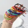 Pulsera tejida de nudo plano de trébol de cuatro hojas de venta caliente transfronteriza para parejas y estudiantes, tendencia europea y americana inspirada en la dopamina, joyería al por mayor de fabricante