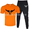 T-shirt Masculina de Manga Curta e Calça Suit Casual Venda Quente Transfronteiriça Gola Redonda Cor Lisa Roupa Esportiva Casual com Estampas e Impressão