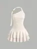 2026 Moda transfronteriza europea y americana color liso un hombro cuello halter cintura entallada vestido plisado versátil vestido sin hombros