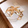 Pulsera abierta de encaje de estrella con goteo de aceite de metal transfronteriza, estilo vintage europeo y americano, joyería de lujo ligero y sensación de alta gama