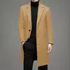 Casaco de lã masculino de comprimento médio, de abotoamento simples, estilo coreano, corte slim, cor sólida, simples, casual e adequado para o trabalho, para outono e inverno.