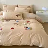 2026 Nuevo Modelo Clase A Grado Materno e Infantil Juego de Cuatro Piezas de Algodón Lavado con Bordado de Toalla, Juego de Ropa de Cama de Cuatro Piezas de Algodón Puro Disponible para la Venta