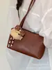 Bolso Pequeño Elegante de Gama Alta para Mujer 2026 Nueva Moda Versátil Bolso Cruzado para Viajar Súper Popular Bolso de Hombro Bolso Cubo
