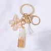 Llavero Colgante de Borla con Letra Inglesa Personalizada de Purpurina Blanca con Resina Epoxi y Colgante de Resina con Pan de Oro, Llavero Sencillo