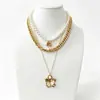 Cadena de Perlas Oceánicas de Venta Caliente Transfronteriza Europea y Americana Cadena para Clavícula de Mujer Colgante de Estrella de Mar y Concha Collar Multicapa Apilable Venta al por Mayor